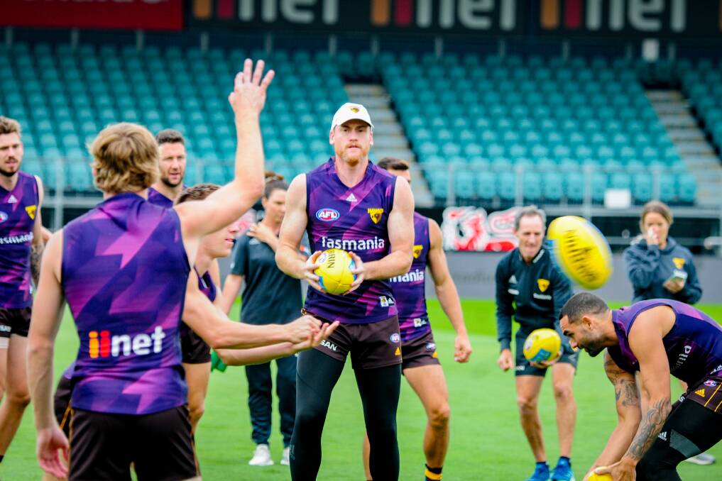 FRONT AND CENTRE: Hawthorn veteran Jarryd Roughead stands tall during drills on Friday at UTAS Stadium ahead of the side's preseason match with Richmond on Saturday night. Pictures: Paul Scambler   