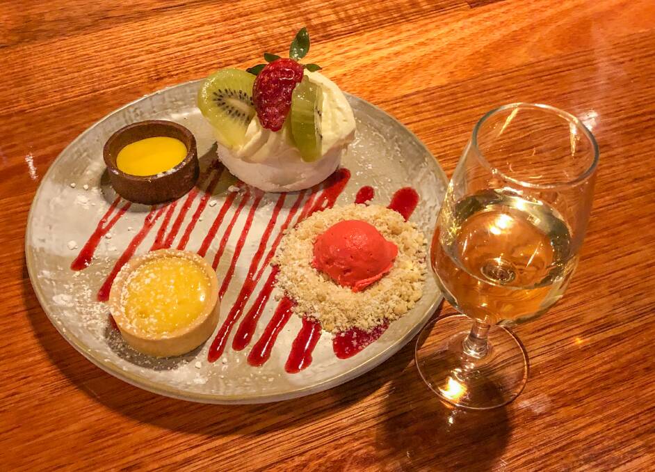 Course 5: dessert tasting plate: a deconstructed berry cheesecake, mini pavlova, lemon curd tart and chocolate custard tart with a Ironhouse Fortified Riesling.