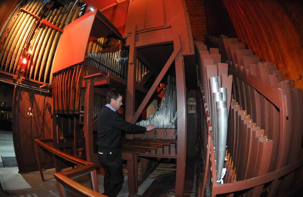 3/07/2013 Warren Prewer, LCC Building Services Co-ordinator, with the Albert Hall pipe organ. 