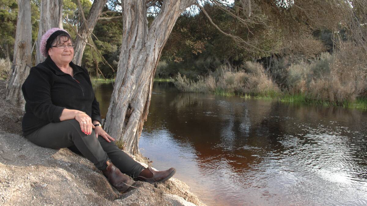  Patsy Cameron on the river bank at "Mannalargenna's Crossing " of the Forester River , near Bridport