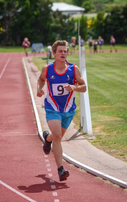 Effort: 15-year-old Connor Wheatley of Flinders Island District High School leads the field in the boys grade 9 1500m. Pictures: PAUL SCAMBLER