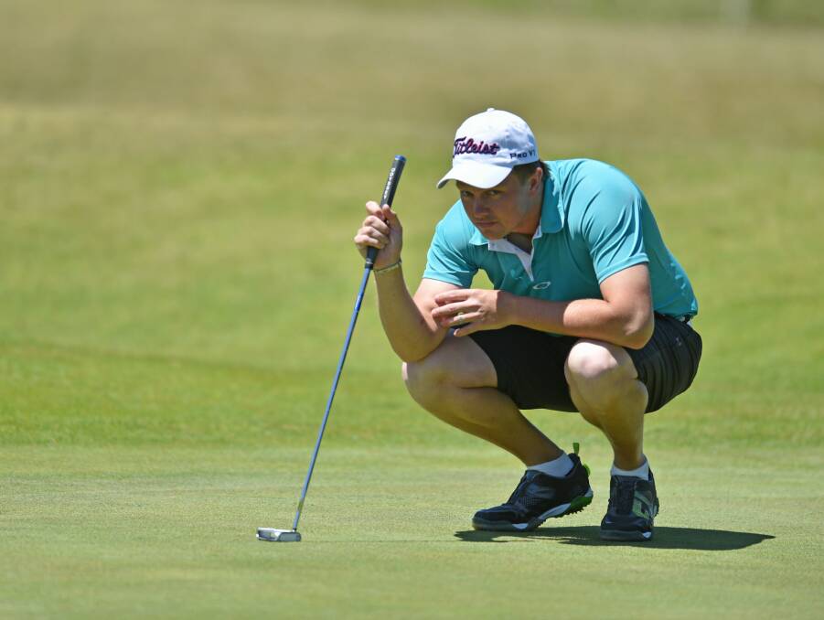 Mitch Van Noord, of Launceston Golf Club, lines up a putt.