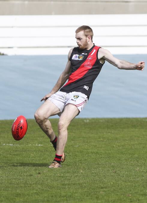 ON FIRE: Josh Ponting gets the ball forward during North Launceston's qualifying final win over Burnie on Saturday. Picture: Cordell Richardson