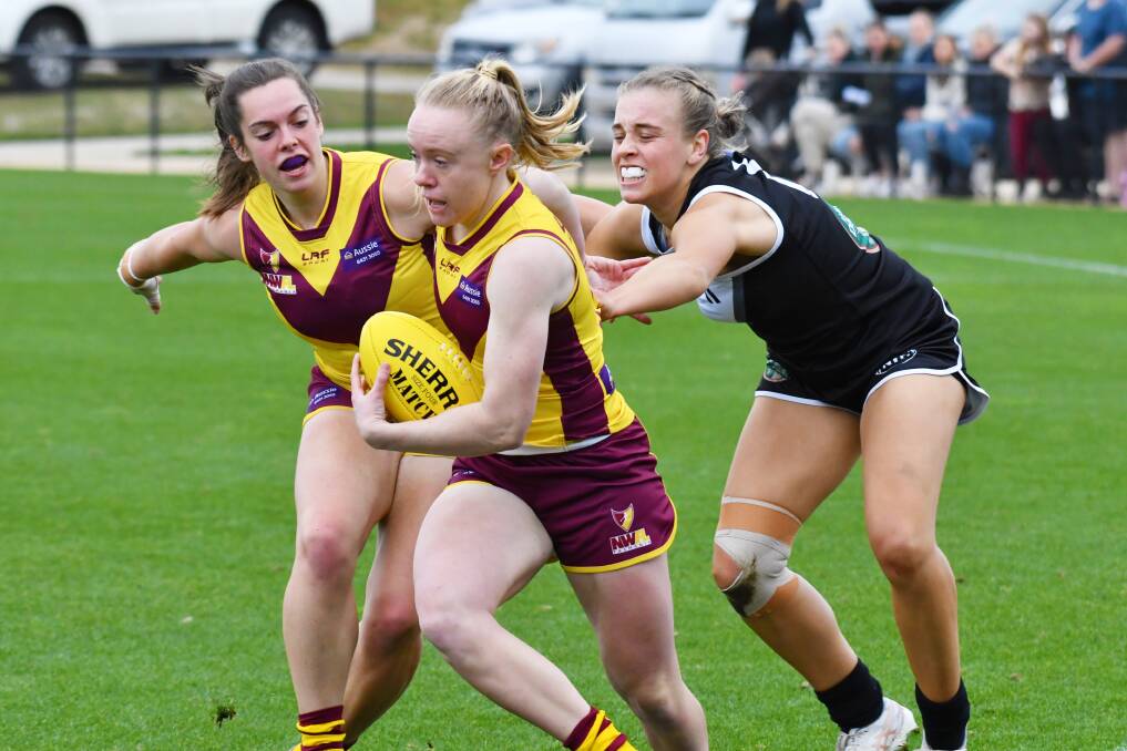  THE MVP: NWFL Women's co-captain Emma Humphries in action against the NTFAW. Picture: Brodie Weeding