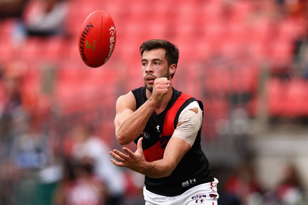 FLYING UP: Essendon midfielder Kyle Langford. Picture: Getty Images
