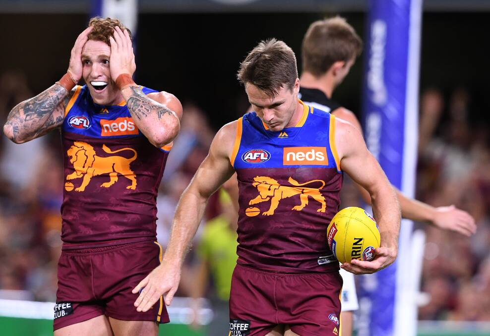 Mitch Robinson reacts to Lincoln McCarthy's big mark on Saturday. Picture: AAP Image/Dave Hunt