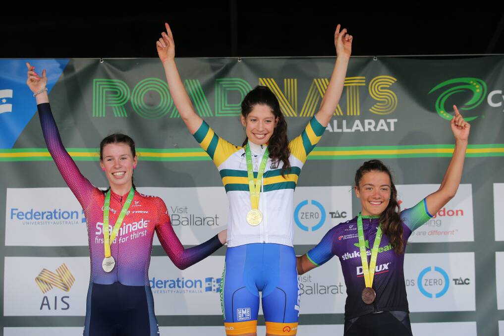 ALL SMILES: Emily Watts, Ruby Roseman-Gannon and Anya Louw on the podium in Ballarat on Friday. Picture: John Veage & Con Chronis - Cycling Australia
