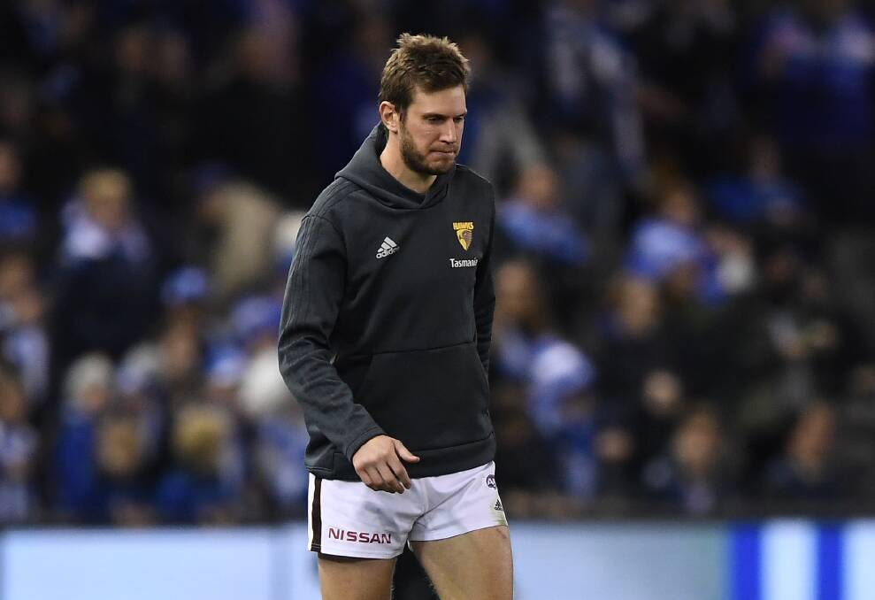 SEASON IN SERIOUS DOUBT: Grant Birchall's hamstring injury has likely ended his season and has placed question marks over the career of the out-of-contract Hawk. Picture: AAP Image/Julian Smith