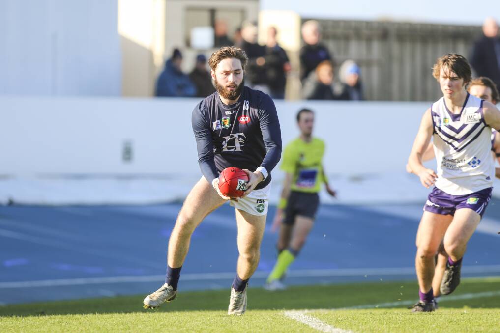  BLUES ON FIRE: Launceston's Jake Smith and his teammates enjoyed their trip to the North-West Coast, recording a big win over Burnie. Pictures: Cordell Richardson
