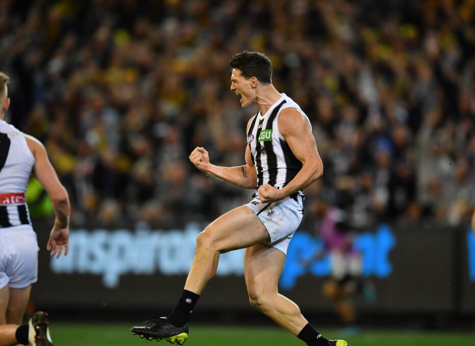 OH WHAT A NIGHT: Brody Mihocek in celebration mode during Collingwood's preliminary final win over Richmond. Picture: Fairfax Media
