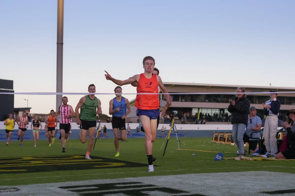 THE POINT OF IT: Stewart McSweyn crosses the finish line in the Burnie Mile on Tuesday. Picture: Simon Sturzaker 