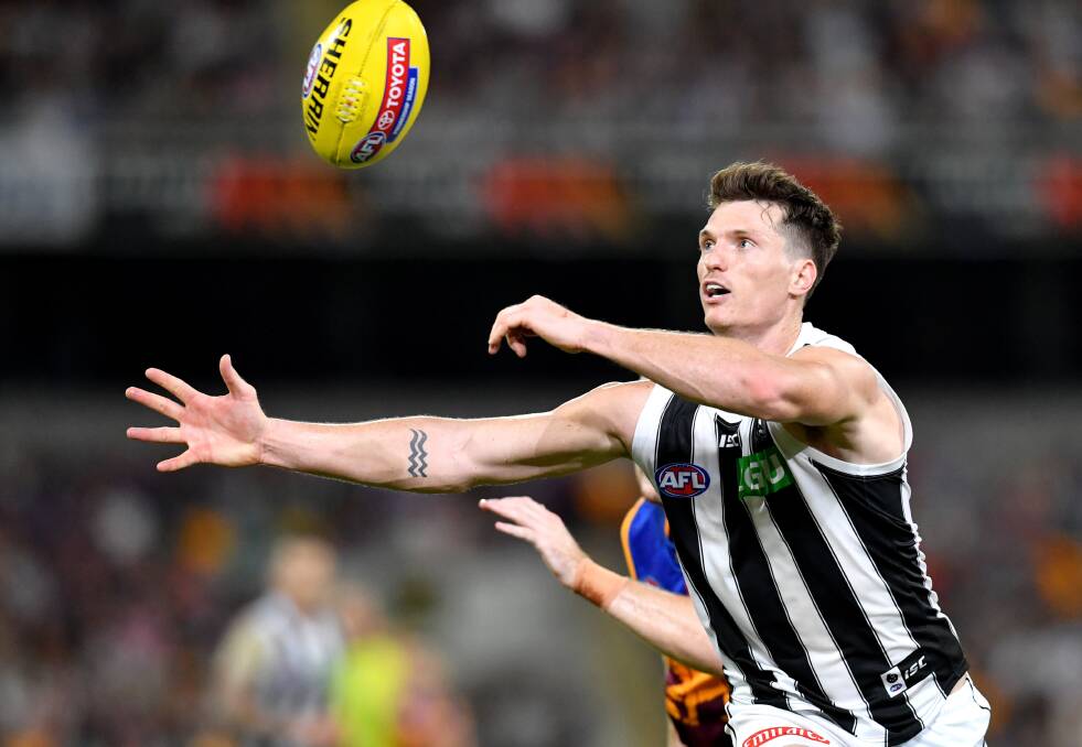 ATTACKING PIE: Brody Mihocek collected an equal career high four goal haul in Collingwood's win over Brisbane. Picture: AAP Image/Darren England