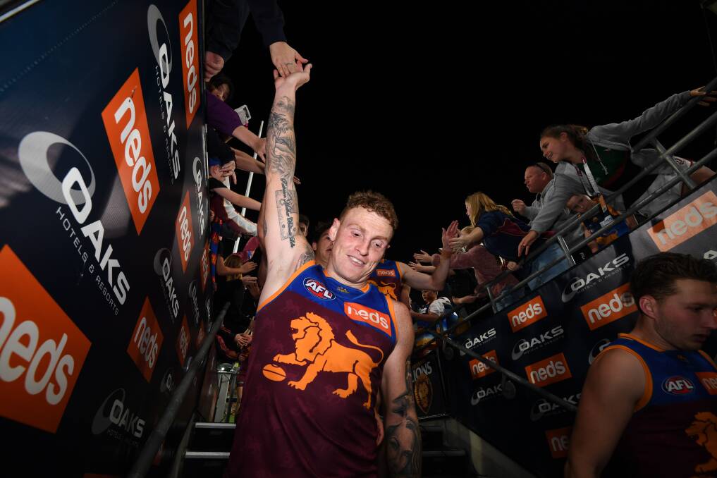 Mitch Robinson celebrates the win over the Western Bulldogs on Sunday. Picture: Dan Peled 