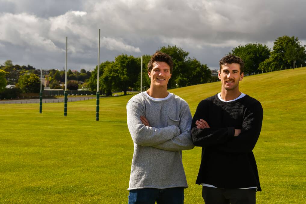 FOOTY FRIENDS: Burnie premiership teammates Brody Mihocek and Robbie Fox. Picture: Simon Sturzaker 
