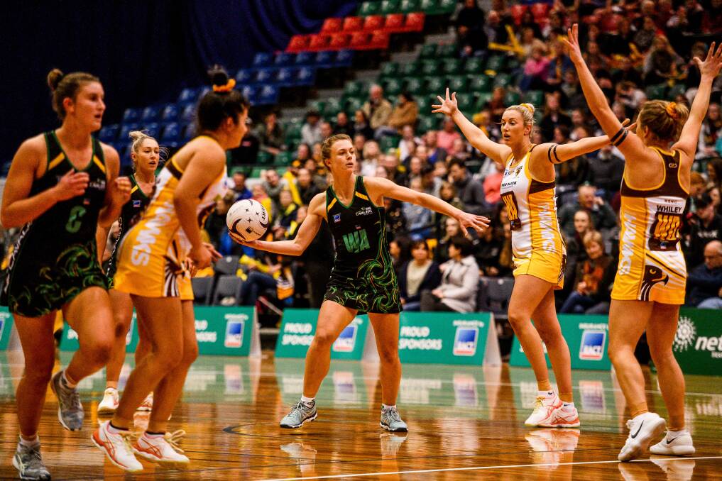 BACK SOON: Cavaliers wing attack Lucy Dennis during last year's Tasmania Netball League grand final. 