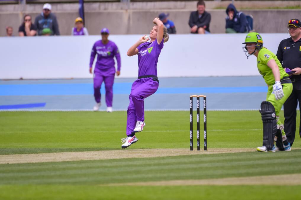 TOUGH DAY: Nicola Carey bowling against her former side Sydney Thunder in Hobart Hurricanes' WBBL loss on Sunday. Picture: Simon Sturzaker