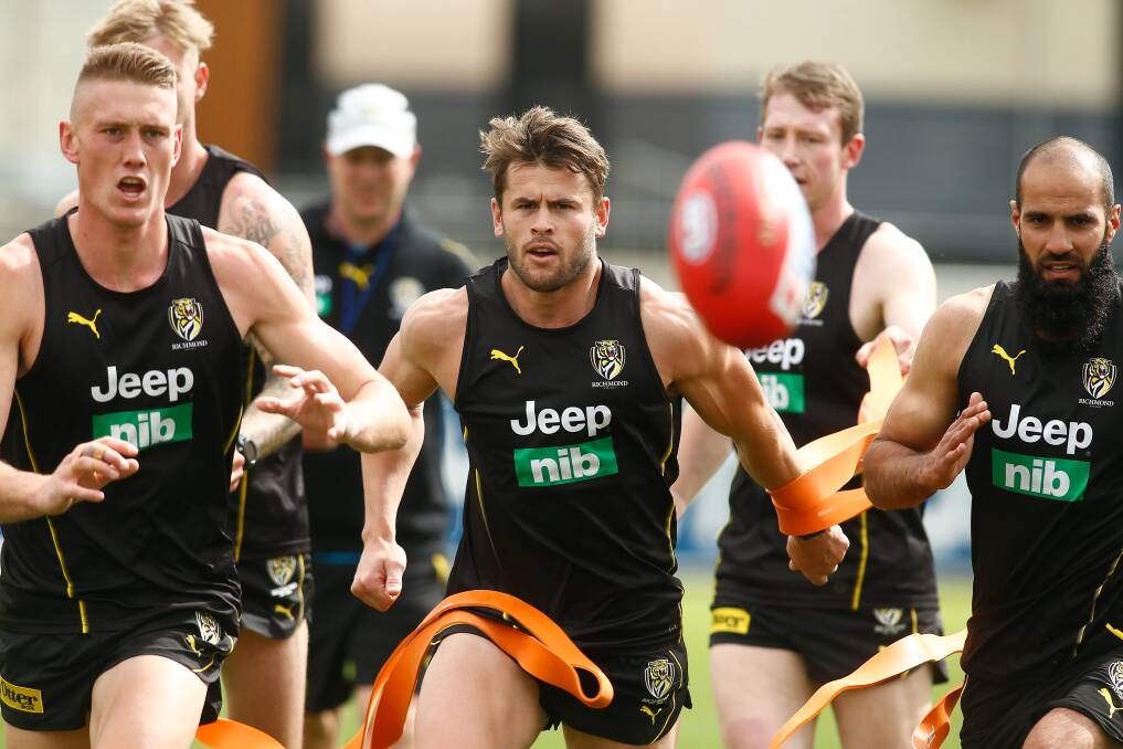 Maverick Weller with Richmond teammates at training recently. Picture: Cam Grimes
