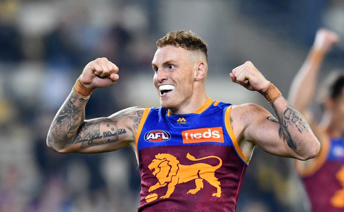HAPPY LION: Mitch Robinson celebrates a goal in Brisbane's win over North Melbourne on Saturday at the Gabba. Robinson will play in his home state on Saturday. Pictures: AAP Image/Darren England 