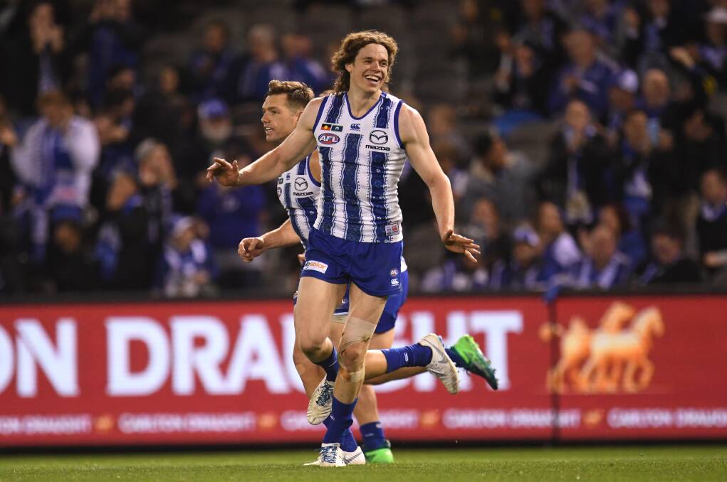 GOOD NIGHT: Ben Brown celebrates one of his five goals on Friday night. Picture: AAP Image/Julian Smith)