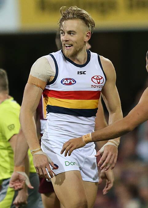 The Late Show: Hugh Greenwood did his best work late for Adelaide on Saturday. Picture: AAP Image/Jono Searle 