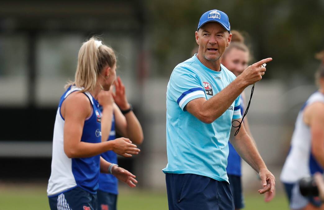 THE NEW MAN IN CHARGE: Darren Crocker at North Melbourne Tasmanian Kangaroos training this pre-season. Four of his Tasmanian players now call Melbourne home. Picture: Getty Images