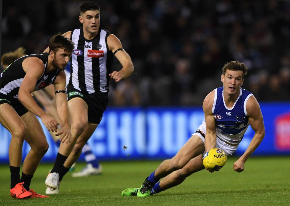 HOPPING TO IT: Kayne Turner in action last week in North Melbourne's win over Collingwood. Picture: AAP Image/Julian Smith