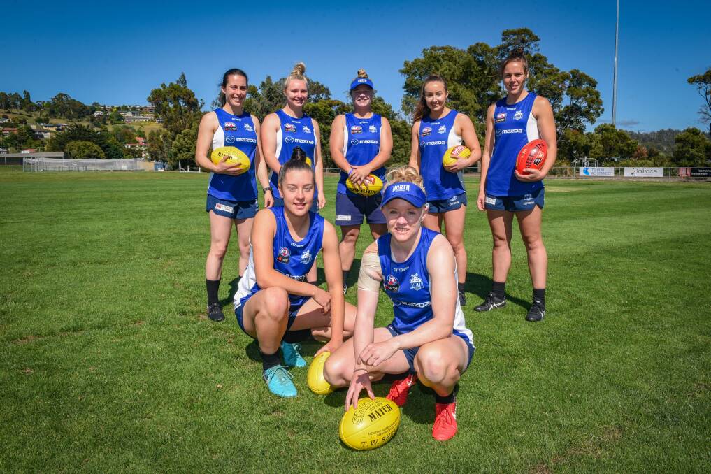 Some of the North Melbourne Tasmanian Kangaroos' Tasmanian population from last season: Chloe Haines, Emma Humphries. Jessie Williams, Daria Bannister, Maddy Smith and Nicole Bresnehan, along with Jasmine Garner. Picture: Paul Scambler
