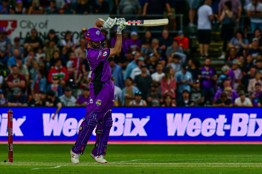 SHOT: Alex Doolan displays some perfect timing in Hobart's win over Perth on Sunday night.