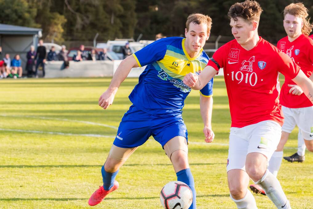 Miles Barnard in action for the Strikers. 