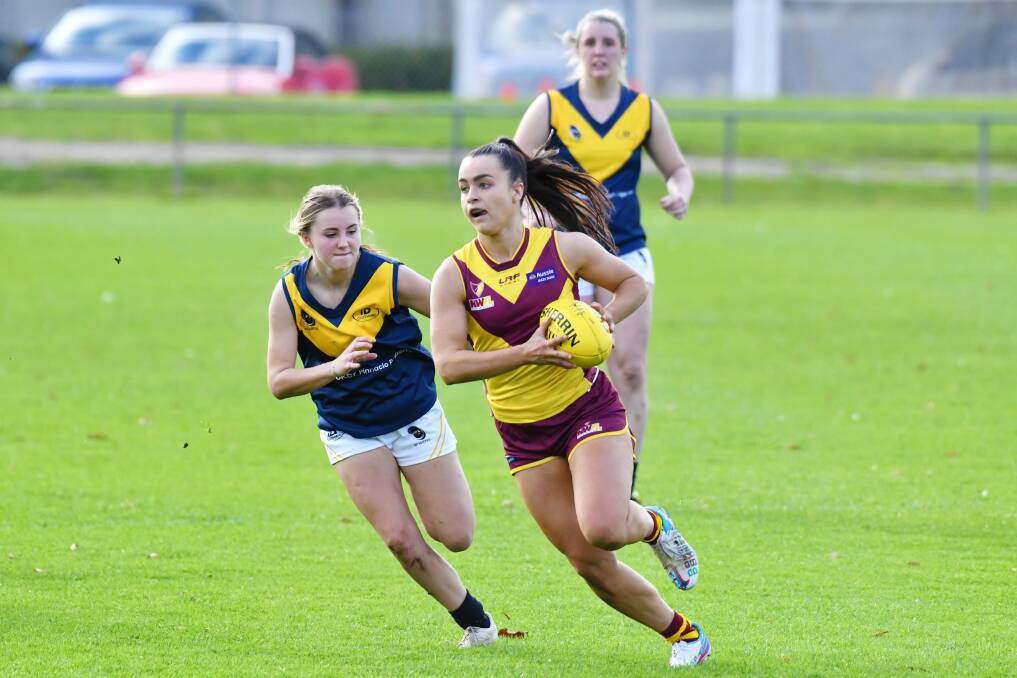 ON THE CHARGE: Abbie Hoiberg-Cox was one of the best for the NWFL Women's side against the SFLW on Saturday. Pictures: Brodie Weeding