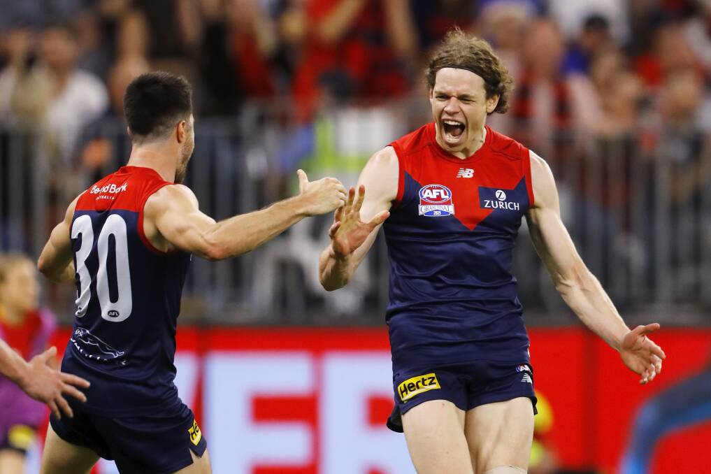 WHAT A NIGHT: Ben Brown celebrates one of his three goals for Melbourne in Saturday's AFL grand final win over Western Bulldogs. Picture: Getty Images