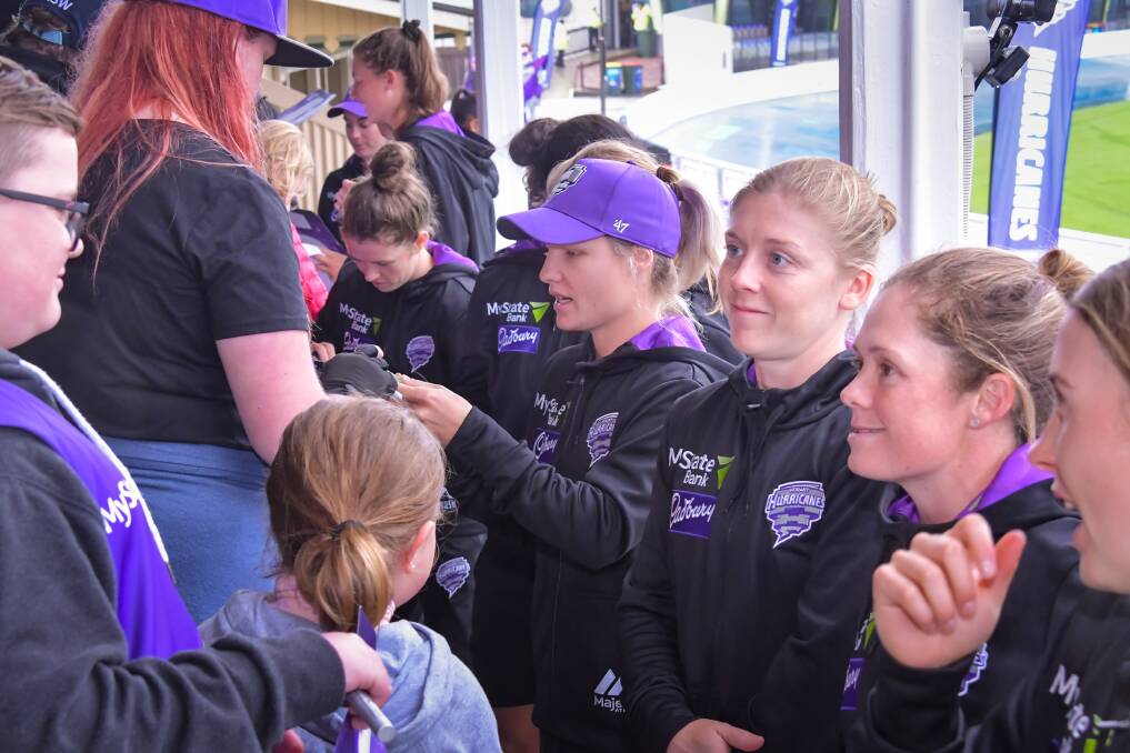 FAN TIME: Nicola Carey, Heather Knight and Corinne Hall took time to chat with fans at a wet West Park on Saturday. Picture: Simon Sturzaker 