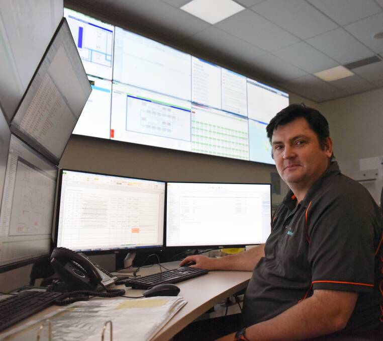 Nerve Centre: Operations Control Centre operator Dave Roberts keeping an eye on data that could affect operations at TasWater assets. Picture: Supplied