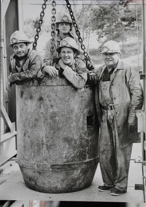 Shift workers Tony Edhouse, Graeme Mahoney and Larry Pisconeri in the kibble at Beaconsfield Gold Mine. Picture: Eddie Kerfott, November, 1988
