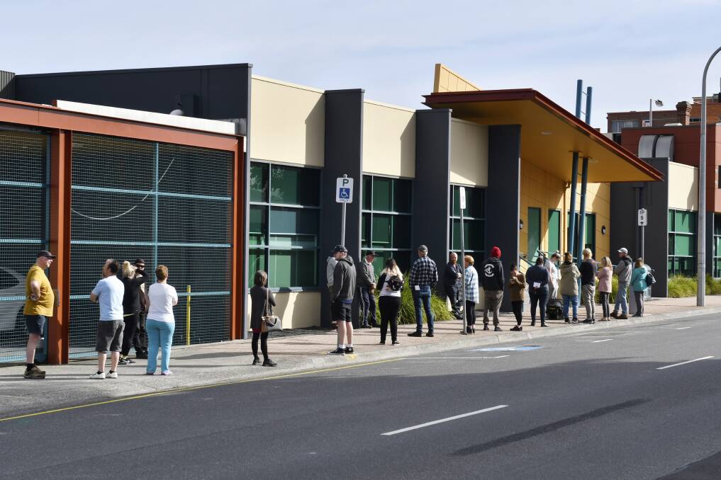 JOB QUE: Line of people outside a Centerlink location in Tasmania's North after mass job losses throughout the COVID-19 pandemic. Picture: Brodie Weeding.