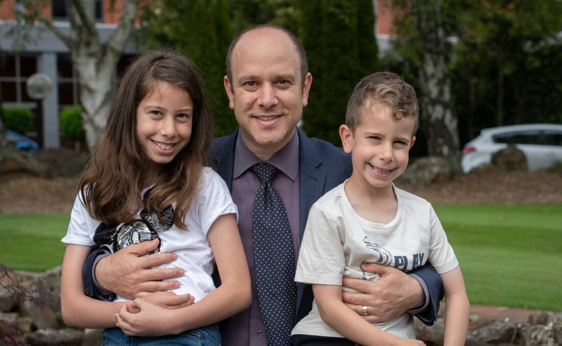 REUNITED: Gil Drory moved to Australia earlier this year when the COVID-19 pandemic kept him away from his two children Shyli and Yoni for five months. Picture: Paul Scambler