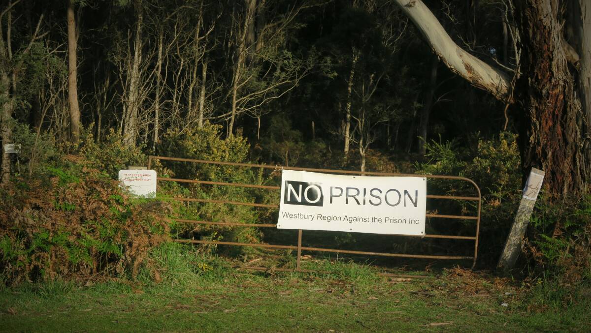 Sign on the gate of the proposed site of a new Northern prison. Picture: Supplied