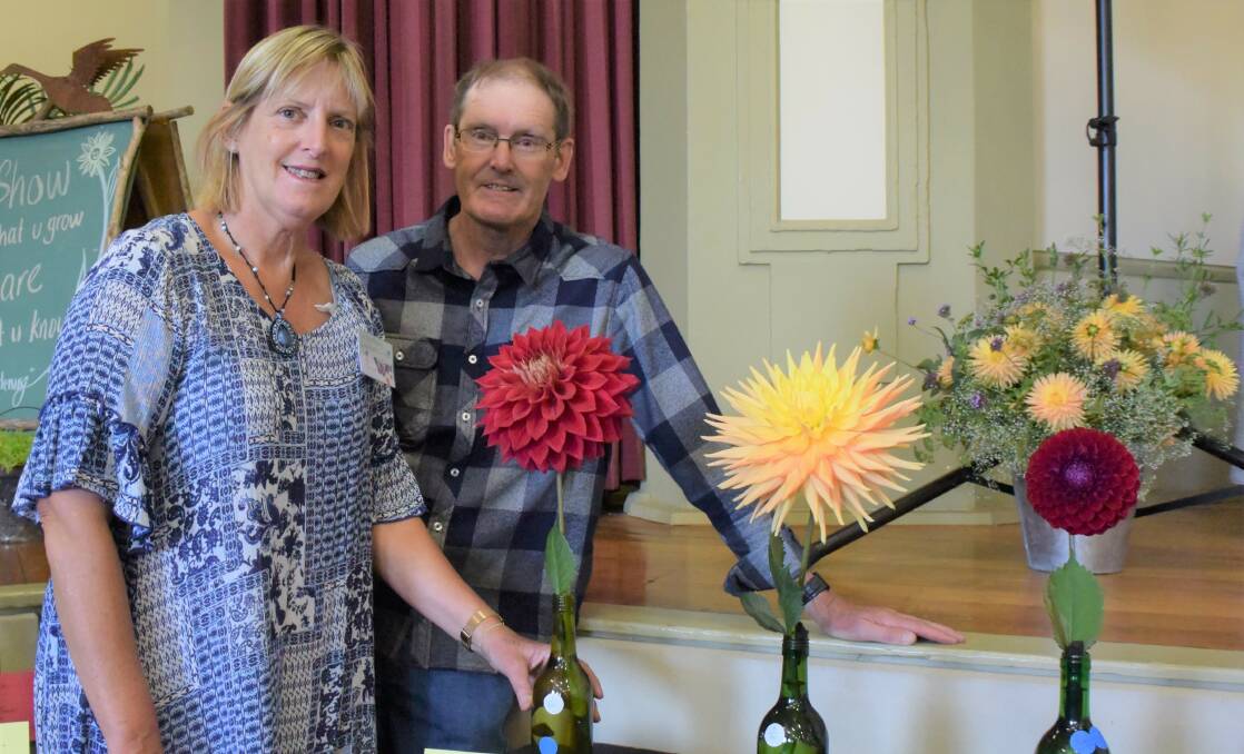 SUMMER: Ros Groom (left) and David Pyke (right) were thrilled with the turn to the Westbury Garden Club summer flower show on Saturday. Picture: Jackson Worthington.