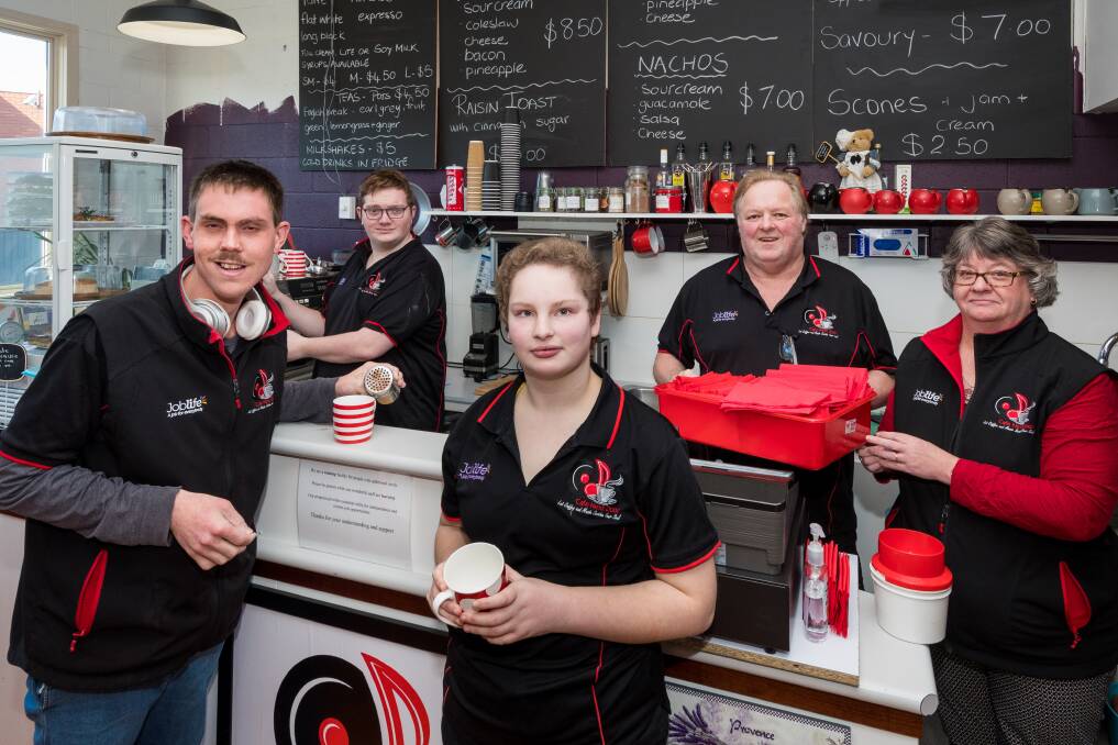 OPPORTUNITY: Cafe Next Door trainee participants Ashley, Josh and Amelia with owners Brett and Vanessa Mitchell. Picture: Phillip Biggs