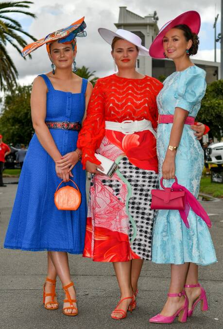 FROCKED UP: Mickayla Anderson, Jenna Dennis and Qulin Chugg. Picture: Scott Gelston.