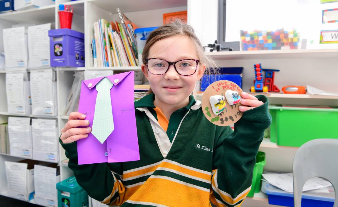 Aaliyah Vanderberg with the card and present she made for her dad. Picture: Neil Richardson