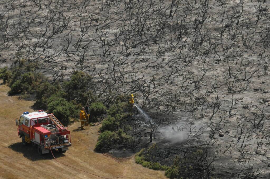 REMNANTS: The aftermath of a bush fire at Bryants Lane in 2012. Picture: Neil Richardson
