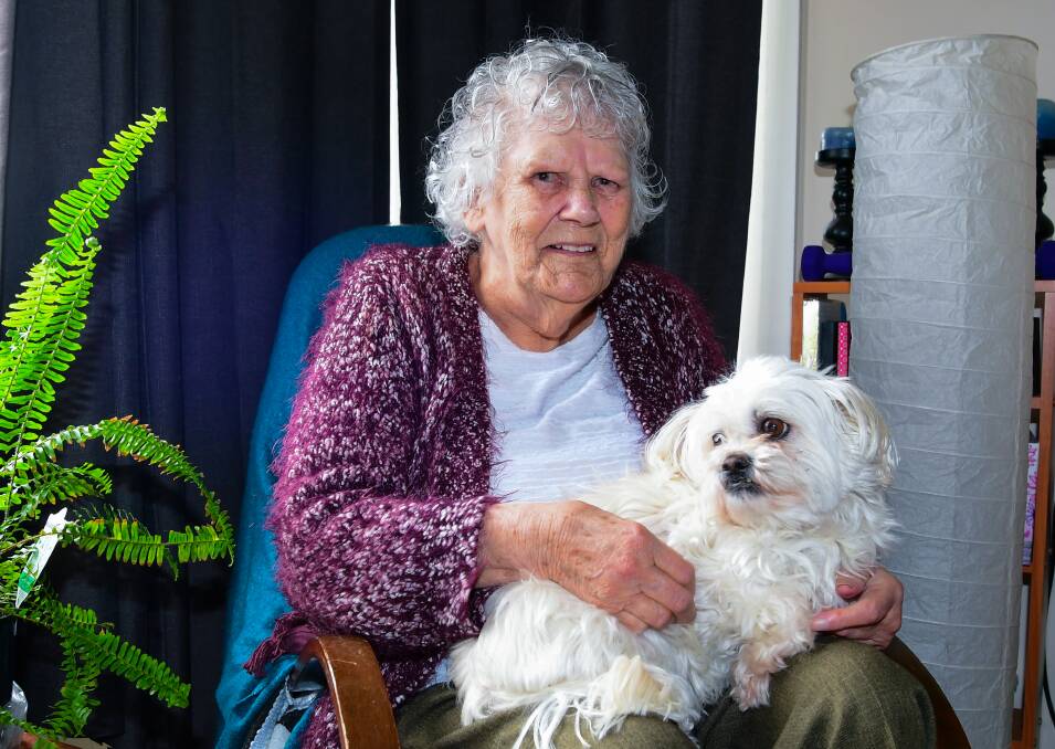 Phyllis Pitchford with her dog. Picture: Neil Richardson