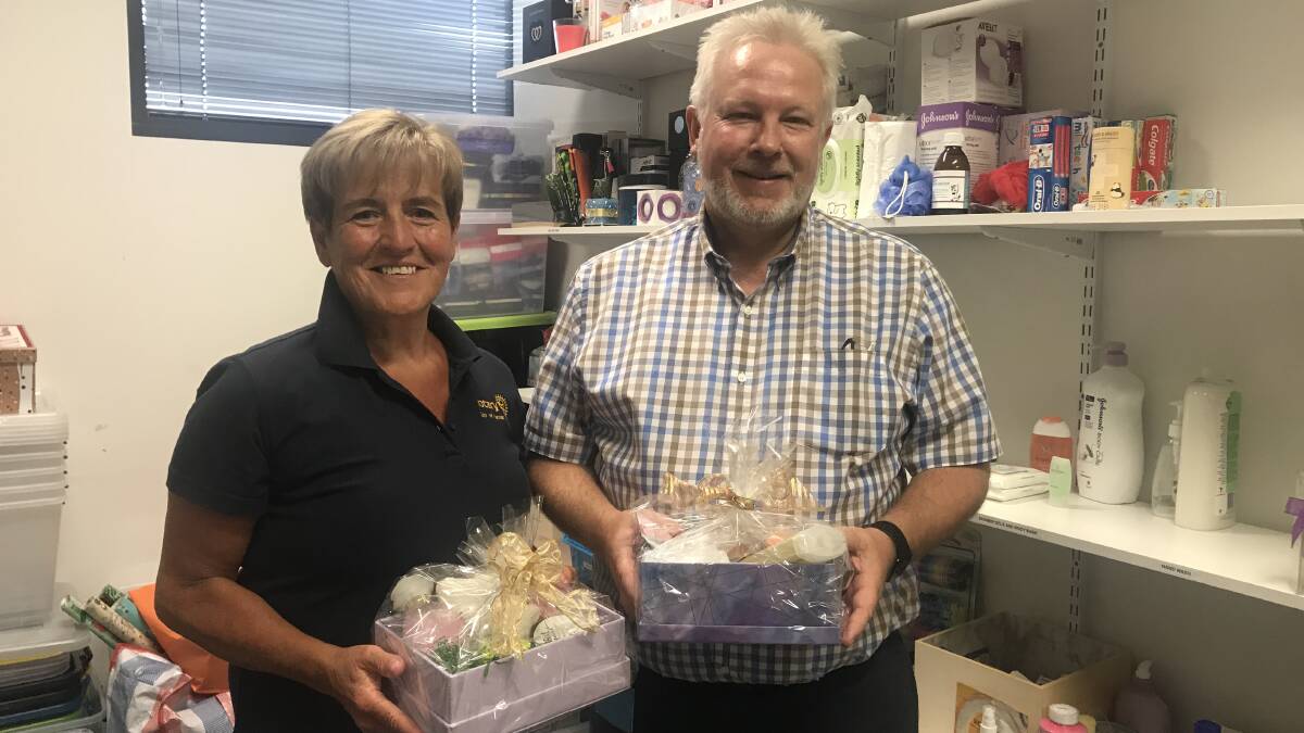 GRASSROOTS: Benevolent Society chief executive Rodney Spinks (right) with Rotary Club of Tamar Sunrise President Susan Renton (left). Picture: Supplied.