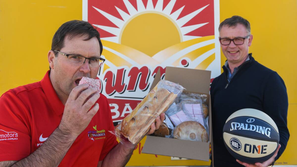FOOD DRIVE: Corey Ackerly and Paul Sellars are proud to support the Winter Relief Appeal. Picture: Paul Scambler