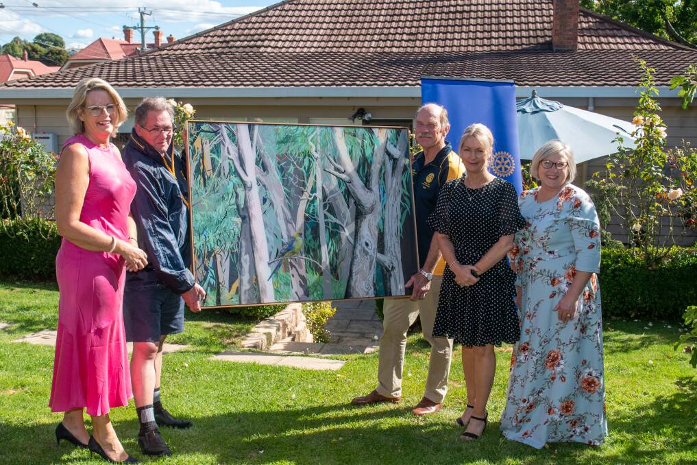 CHARITY: Diana Butler, Terry Crawford, Dale Luck, Sonia Morganti and Glenda Isles with the feature item for the live auction. Picture: Paul Scambler