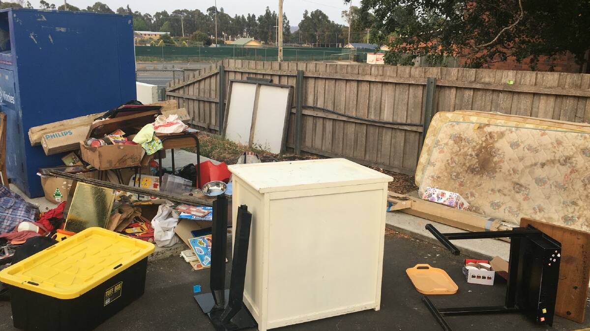 Staff at St Vincent de Paul in Mowbray arrived at work to find unwanted goods had been dumped near their bins contaminating their donations. Photos: St Vincent de Paul Tasmania