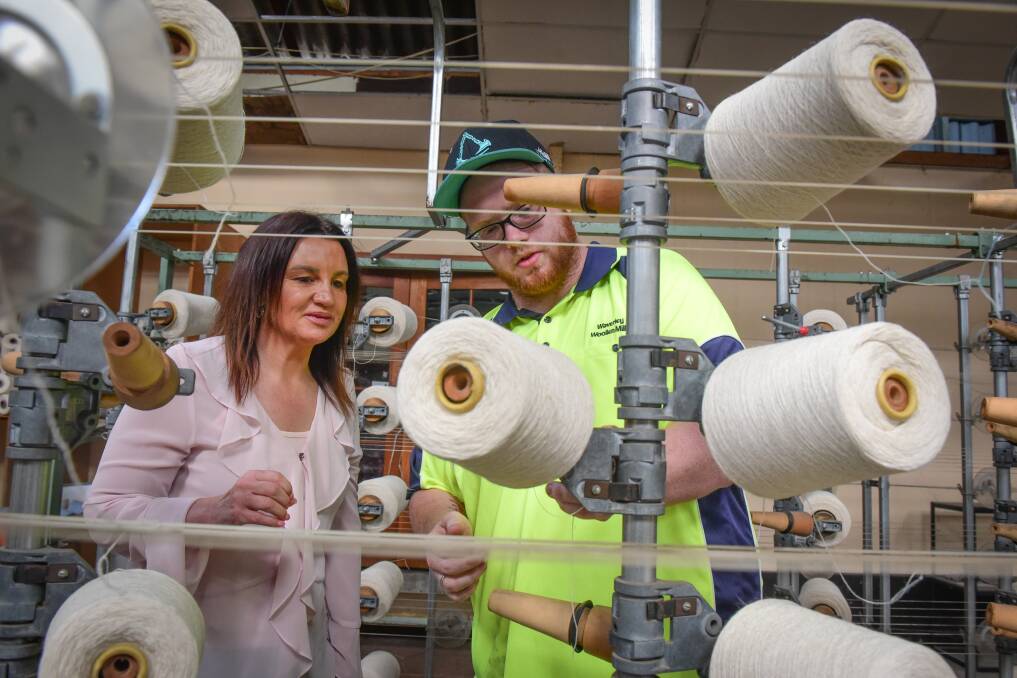 Senator Jacqui Lambie with mill employee James Turner at the Waverley Woolen Mills
Picture: Paul Scambler 