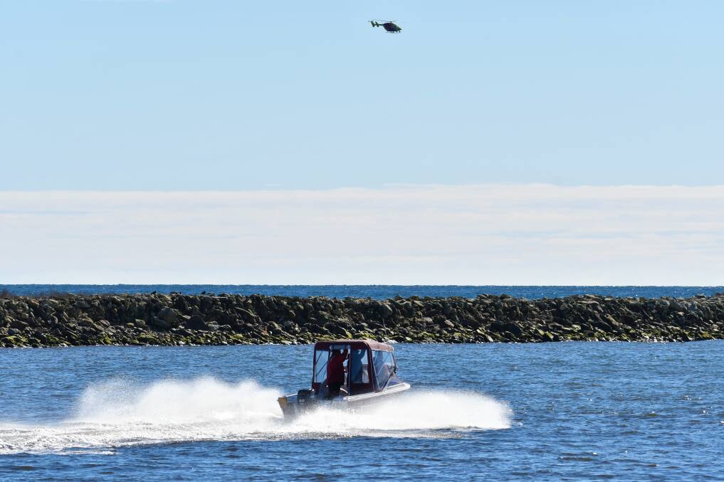 SEARCH EFFORTS: There has been a sea and air response to help find the missing people. Picture: Brodie Weeding 