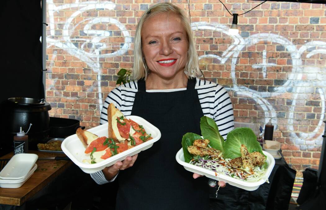 FOOD TIME: Chef Eliza Allan with some of her vegan dishes at Launceston's Harvest Festival on Saturday, ahead of Festivale 2020. Picture: Neil Richardson.